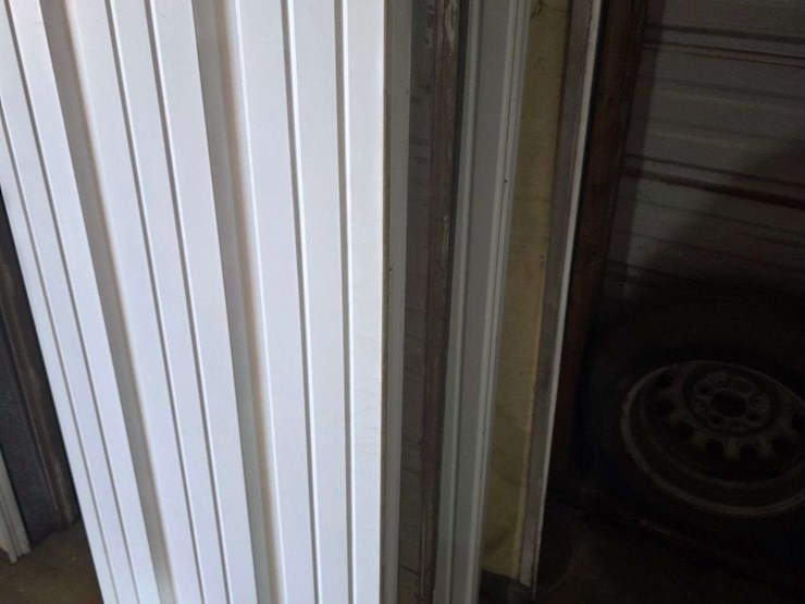 (1)-used-12’-x-9’-garage-door,-¾”-foam-insulation,-comes-with-all-track-(high-lift-track-up-to-14’),-image-4