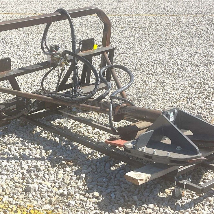 Skid steer hydraulic rotating high reach tree shear, from the estate of Dr. Ken Buchmann