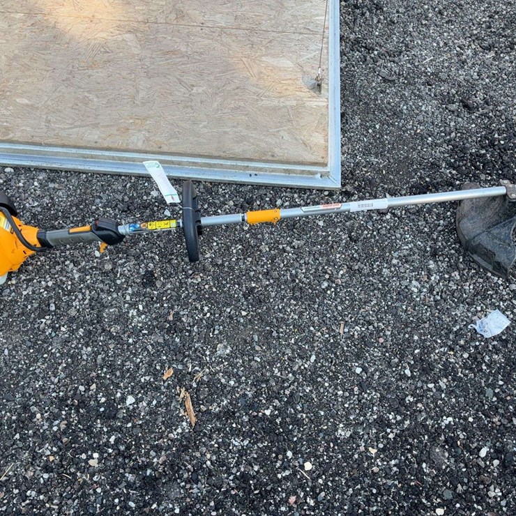 Cub cadet combo unit with weed whip head
