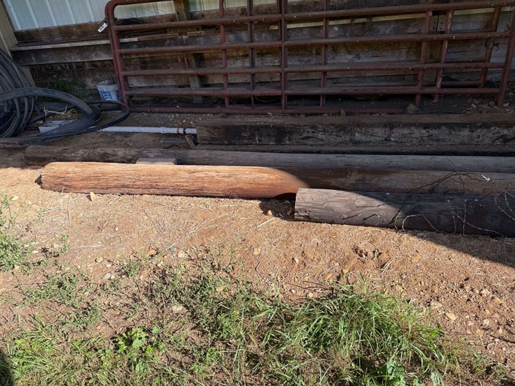 large-assortment-of-wood-fence-posts,-railroad-ties,-rebar,-wire-image-3