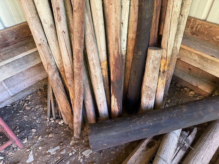 large-assortment-of-wood-fence-posts,-railroad-ties,-rebar,-wire-image-8