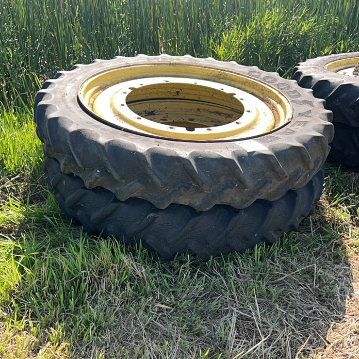Set of four skinny tires, size 320/90/R50 came off of John Deere 8300, would fit others