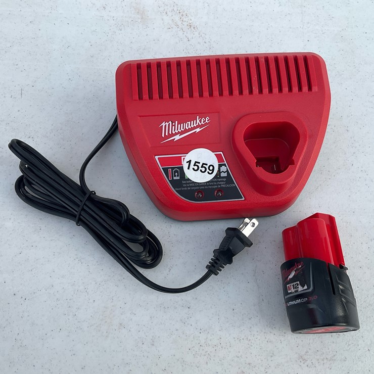 #1559 • Milwaukee M12 Battery And Charger Combo