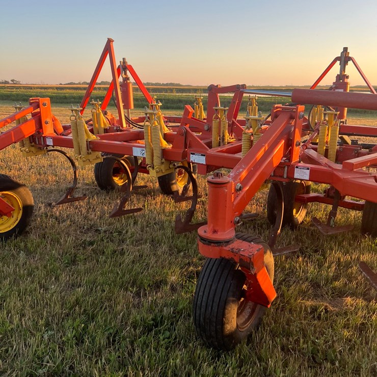 Bourgault chisel, heavy harrows, Note: hitch slightly bent in one spot, doesn’t affect performance of machine as hitch is floating.