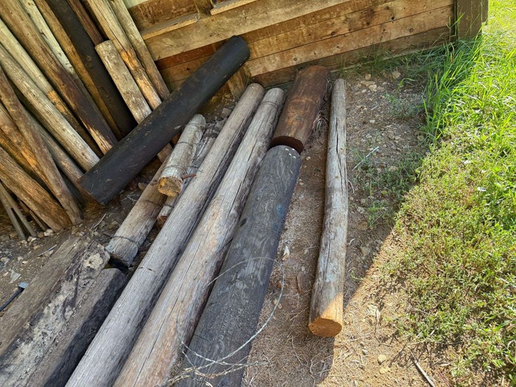 large-assortment-of-wood-fence-posts,-railroad-ties,-rebar,-wire-image-4