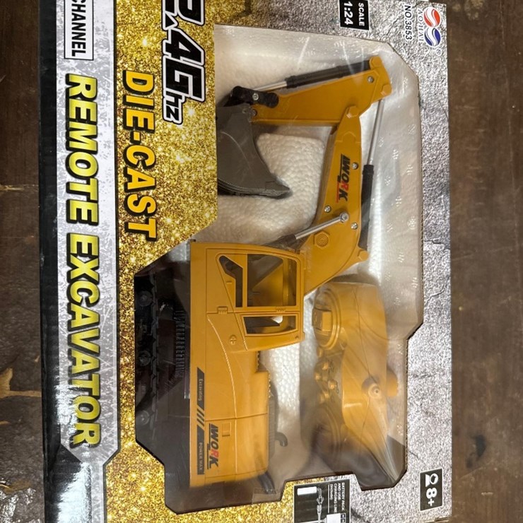 UNUSED TOY DIE-CAST REMOTE CONTROLLED EXCAVATOR