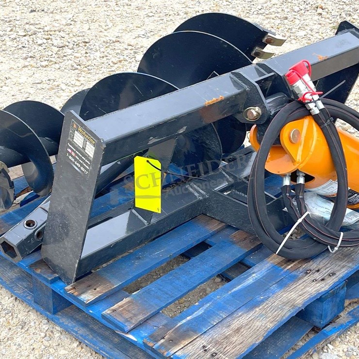 Unused Wolverine skid steer auger w/ 2 augers