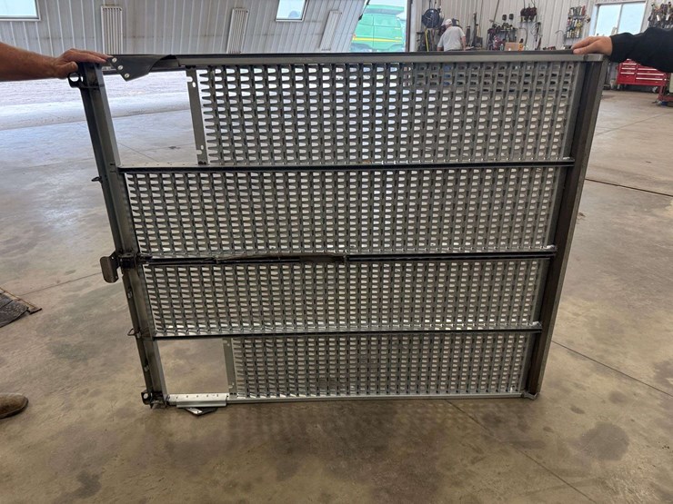 top-sieve-out-of-a-john-deere-9770-combine-image-1