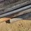 large-assortment-of-wood-fence-posts,-railroad-ties,-rebar,-wire-image-5