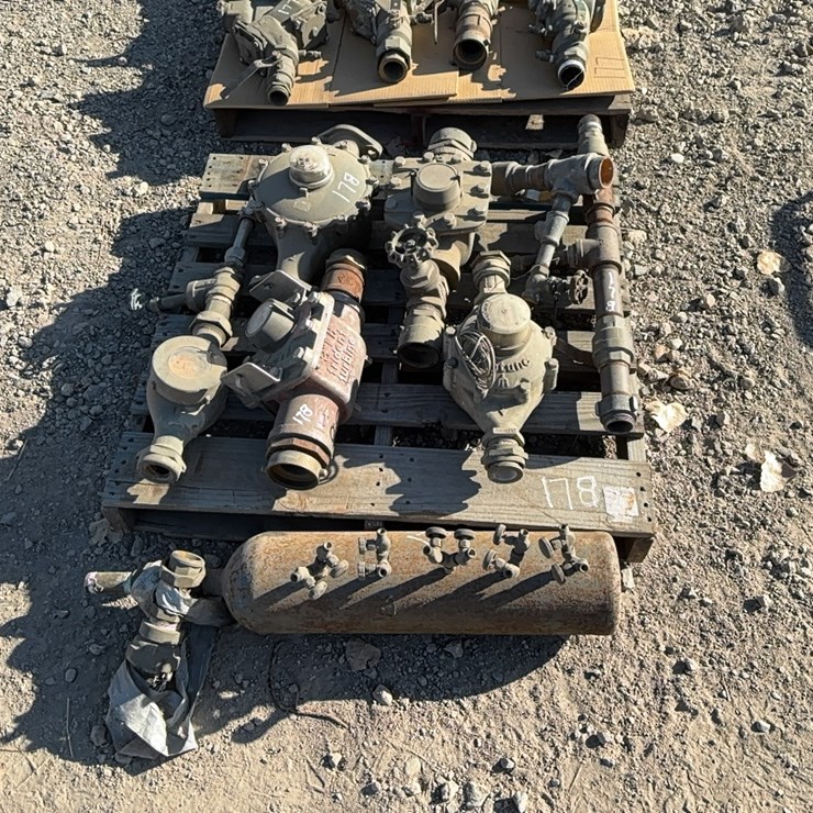 PALLET OF WATER METERS AND A MANIFOLD SUPPORT EQUIPMENT