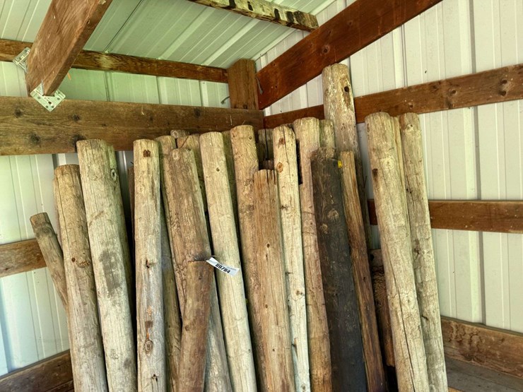 large-assortment-of-wood-fence-posts,-railroad-ties,-rebar,-wire-image-7