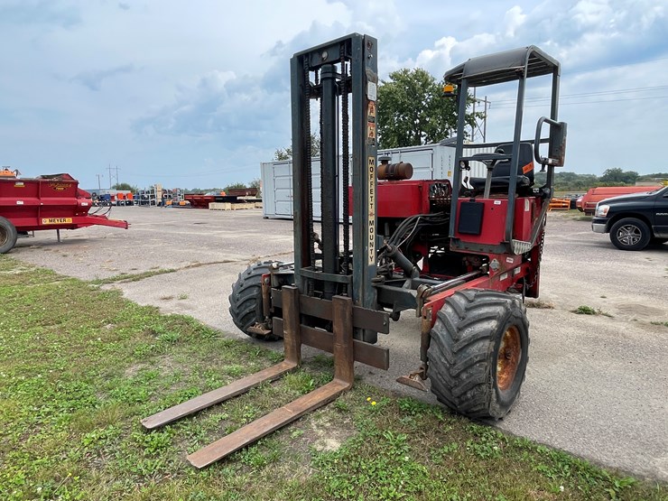 #1020-•-2002-moffett-piggy-back-forklift-image-1