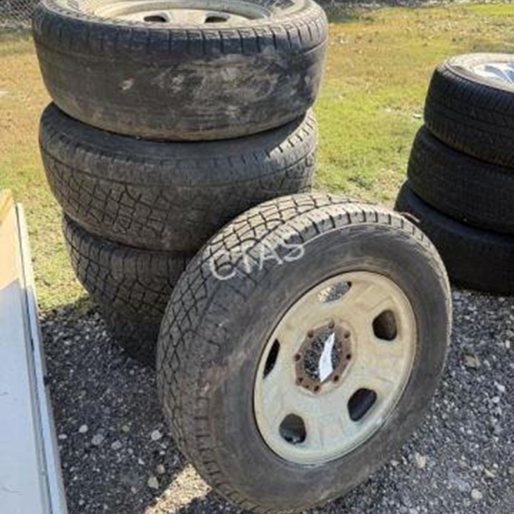 #136 • (5) 8 Lug Rims - 275/65R18