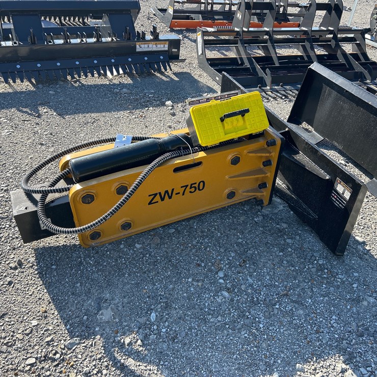 #71 • SKID STEER HYDRAULIC HAMMER WITH TWO BITS