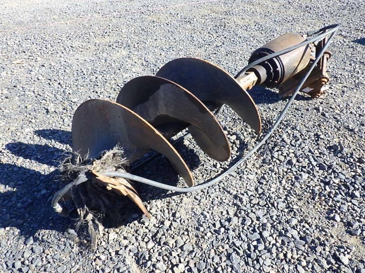 cat-hydraulic-excavator-auger-attach.-image-1
