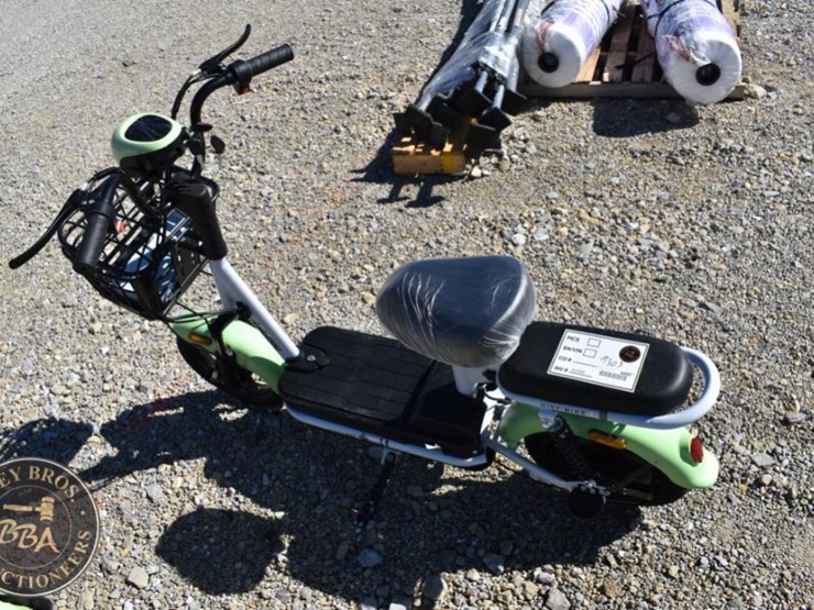 future-electric-scooter,-green-&-black,-serial-9303,-front-basket-image-1