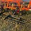 54’-bourgault-chisel,-12”-space,-heavy-harrows,-note:-hitch-slightly-bent-in-one-spot,-doesn’t-affect-performance-of-machine-as-hitch-is-floating.-image-36
