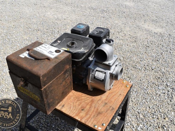 craftsman-water-pump-engine,-gasoline,-with-metal-box-and-hose-image-1