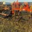 54’-bourgault-chisel,-12”-space,-heavy-harrows,-note:-hitch-slightly-bent-in-one-spot,-doesn’t-affect-performance-of-machine-as-hitch-is-floating.-image-45