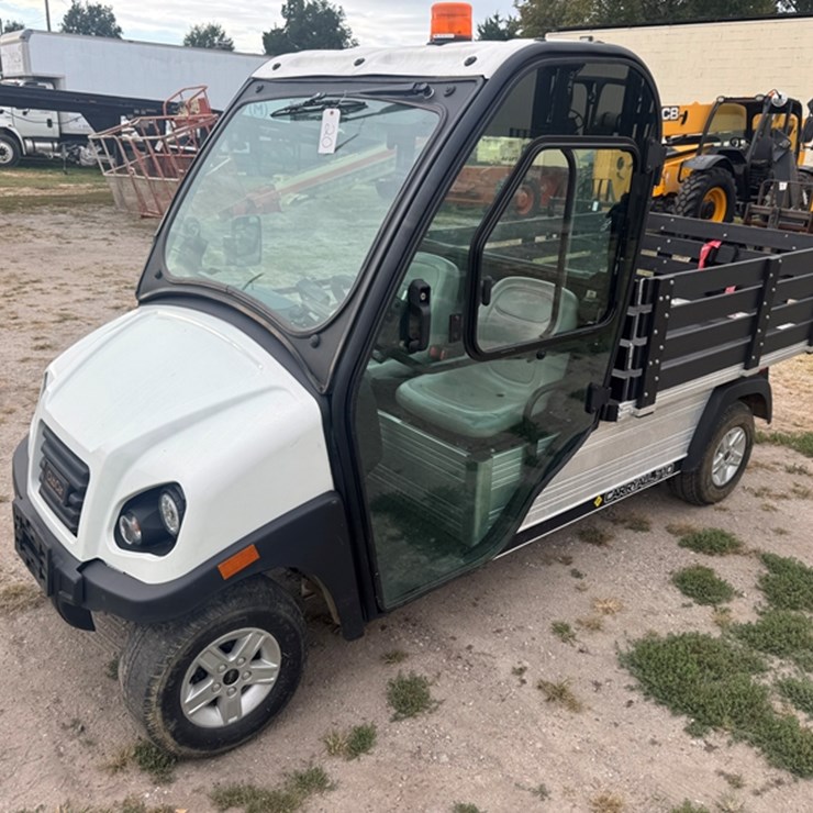 CLUB CAR CARRY ALL 710 ELECTRIC GOLF CART CAB, ELECTRIC DUMP 203HRS SHOWING AND 2033 MILES