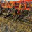 54’-bourgault-chisel,-12”-space,-heavy-harrows,-note:-hitch-slightly-bent-in-one-spot,-doesn’t-affect-performance-of-machine-as-hitch-is-floating.-image-39