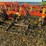 54’-bourgault-chisel,-12”-space,-heavy-harrows,-note:-hitch-slightly-bent-in-one-spot,-doesn’t-affect-performance-of-machine-as-hitch-is-floating.-image-34