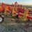54’-bourgault-chisel,-12”-space,-heavy-harrows,-note:-hitch-slightly-bent-in-one-spot,-doesn’t-affect-performance-of-machine-as-hitch-is-floating.-image-16