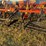 54’-bourgault-chisel,-12”-space,-heavy-harrows,-note:-hitch-slightly-bent-in-one-spot,-doesn’t-affect-performance-of-machine-as-hitch-is-floating.-image-42