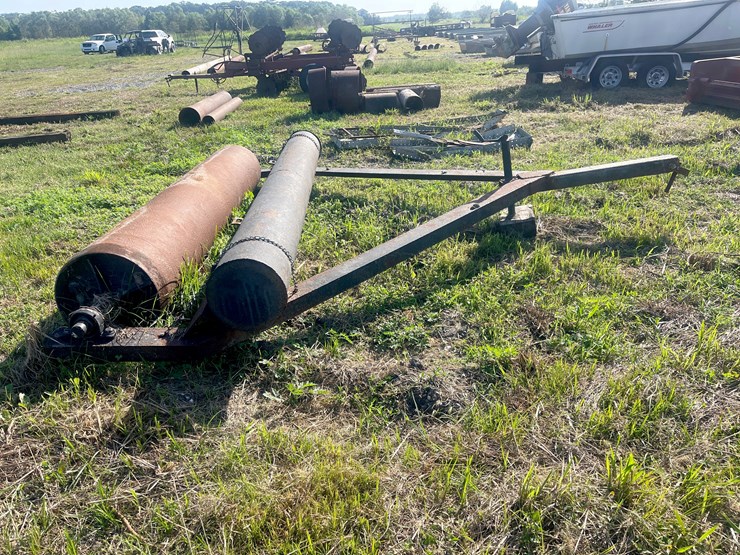 #135-•-lot-with-pull-behind-roller-bar-image-1
