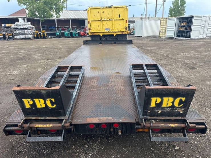 steel-deck-16+4-ft-x-8ft-tri-axle-equipment-trailer-image-3