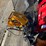 new-giyi-co-mini-stand-on-skidloader-rotating-grapple-image-1
