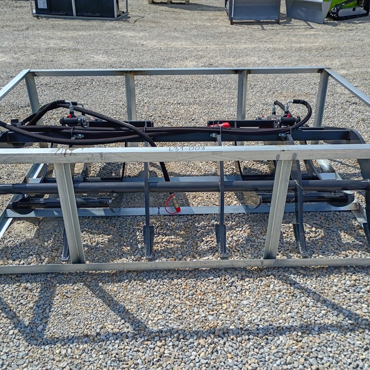 #L39-003 • Wolverine Brush Grapple Skid Steer Attachment