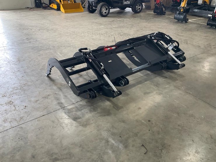 #1428-•-unused-wolverine-skid-steer-brush-grapple-image-1