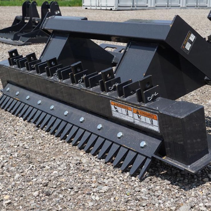 #1366 • New! Wolverine Skid Steer Ripper Attachment