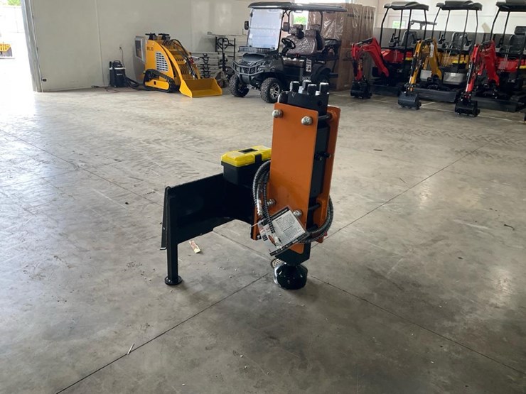 #1430-•-unused-wolverine-skid-steer-post-driver-image-1