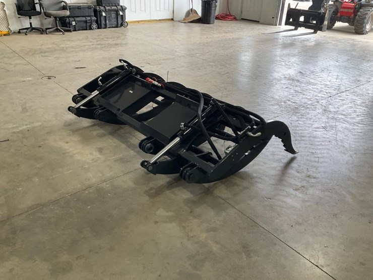 #1428-•-unused-wolverine-skid-steer-brush-grapple-image-2