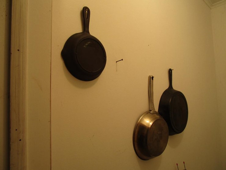 5827 • (2) Cast Iron Skillets and Nuwave Pan Lot 5827, John Deere