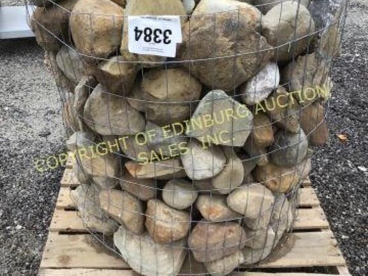 D. Pallet of river rock Lot 3384, ONLINE CONSIGNMENT AUCTION, 11/18