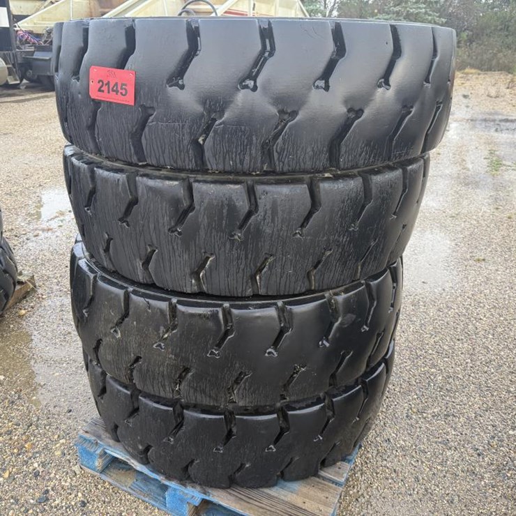 #2145 • (4) Super Grip Grader Tires