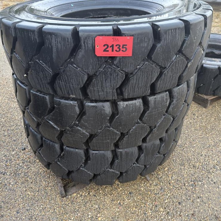 #2135 • (4) Super Grip Grader Tires