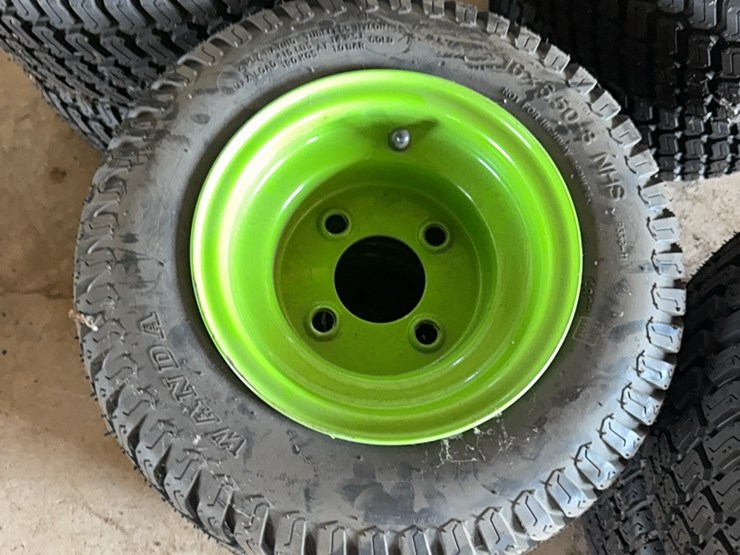 new-pair-of-16x6.50-8-tire-with-4-lug-wheel-image-1