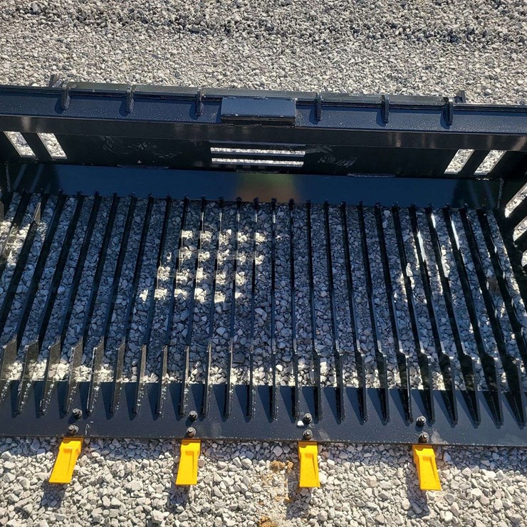 Skid steer rock bucket. 66" wide.