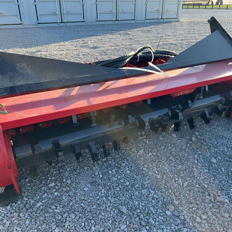 Skid steer loader mulcher
