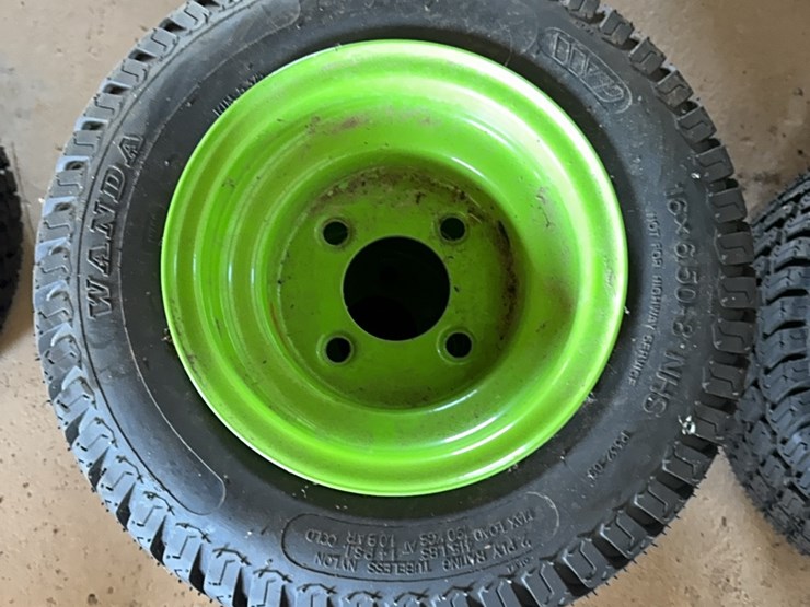 new-pair-of-16x6.50-8-tire-with-4-lug-wheel-image-1