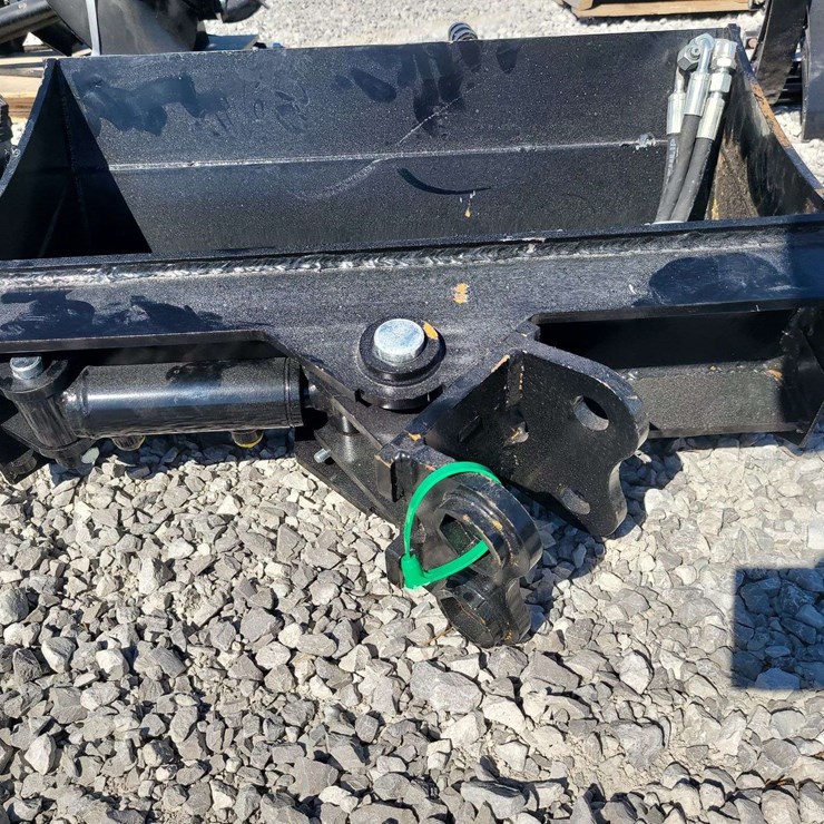 24" wide tilting mini excavator bucket.