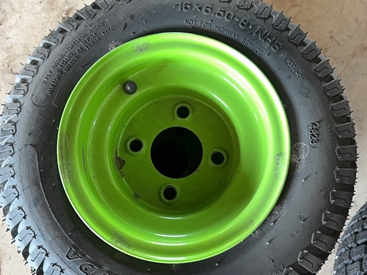 new-pair-of-16x6.50-8-tire-with-4-lug-wheel-image-1