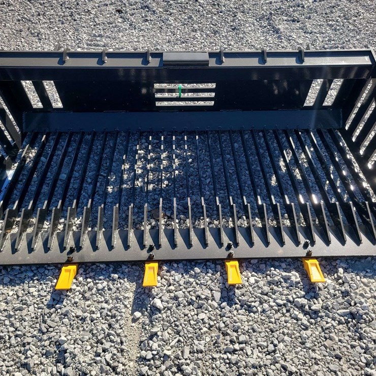 Skid steer rock bucket. 66" wide.