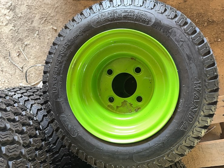 new-pair-of-16x6.50-8-tire-with-4-lug-wheel-image-1