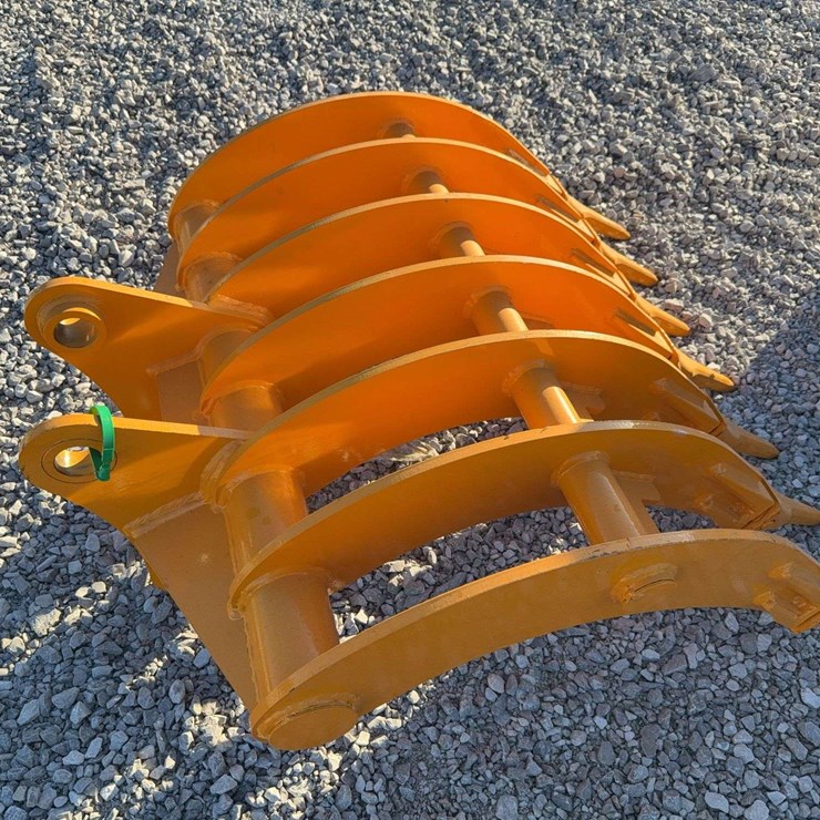 Excavator rake with teeth
