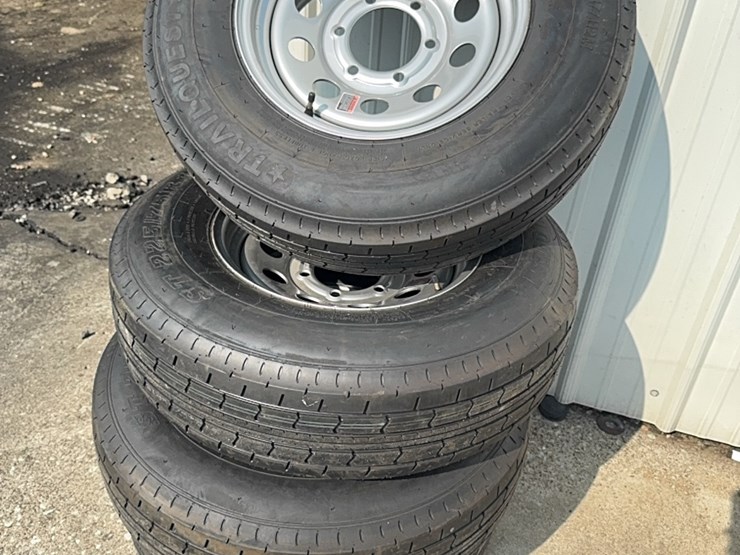 four-225/75/r15-tires-with-6-lug-wheels-image-1
